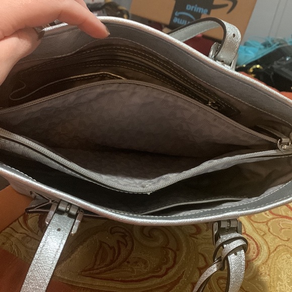 Michael Kors Silver Purse- Divided compartments. Roomie but not overly big! - Picture 3 of 9